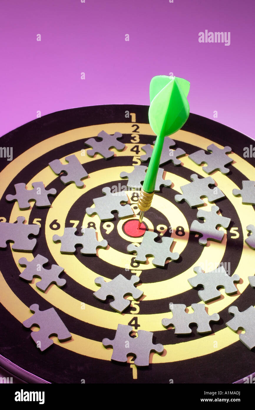 Dart and Jigsaw Puzzle Pieces on Dartboard Stock Photo Alamy