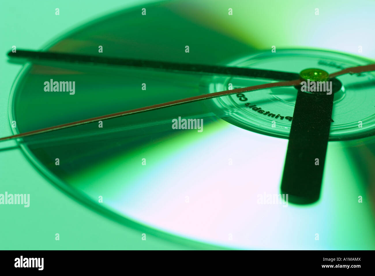 Clock Hands on CD Stock Photo - Alamy