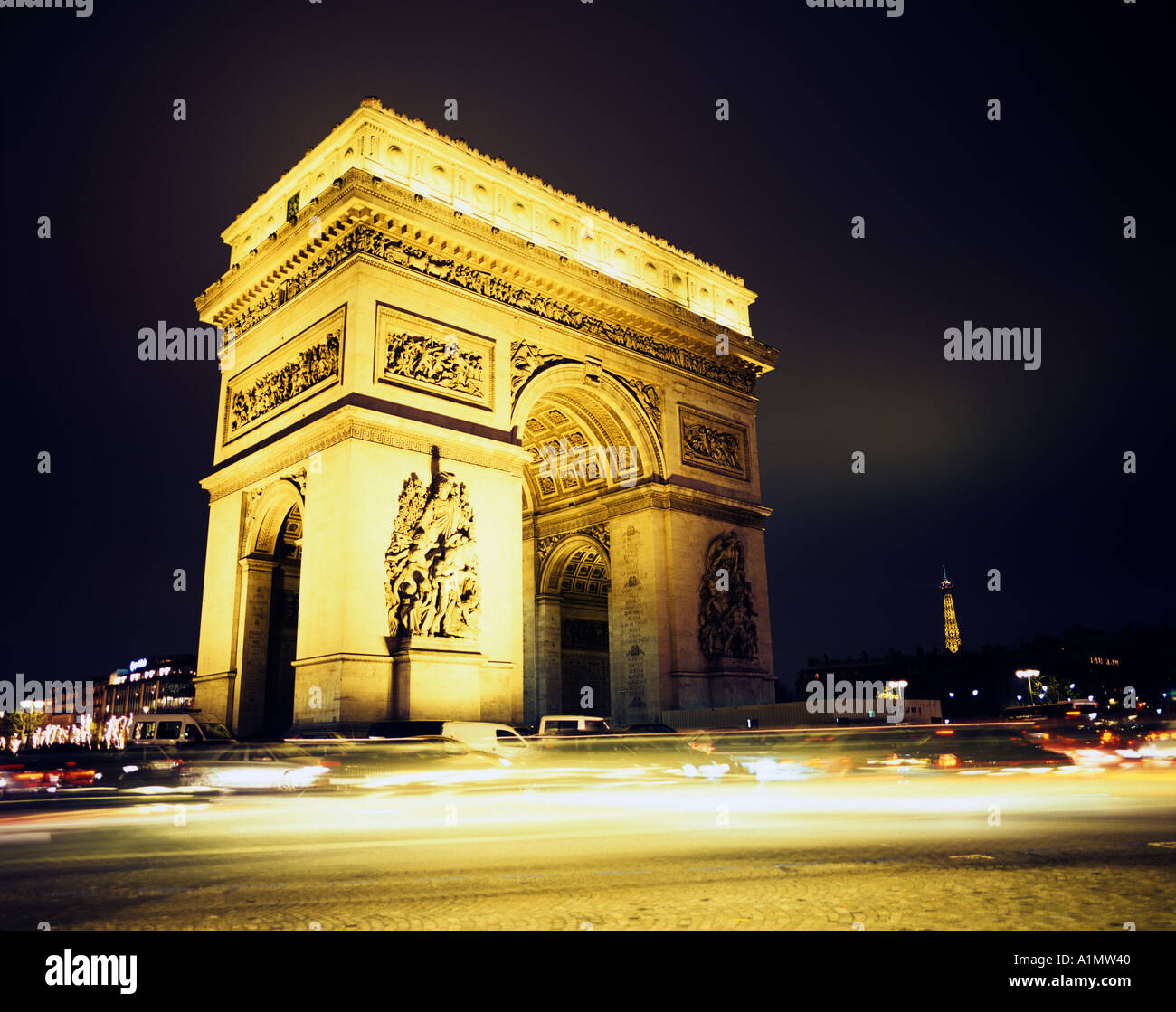 A night view of the Arc de Triomphe in Paris France Stock Photo
