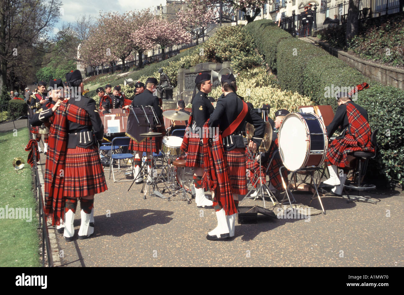 Princes Street Gardens military band gathering & preparing to provide music in support of wreath laying parade ceremony City of Edinburgh  Scotland UK Stock Photo