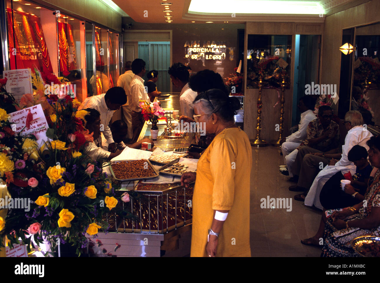 CELEBRATING THE OPENING OF YET ANOTHER GOLD SHOP IN SINGAPORE Stock