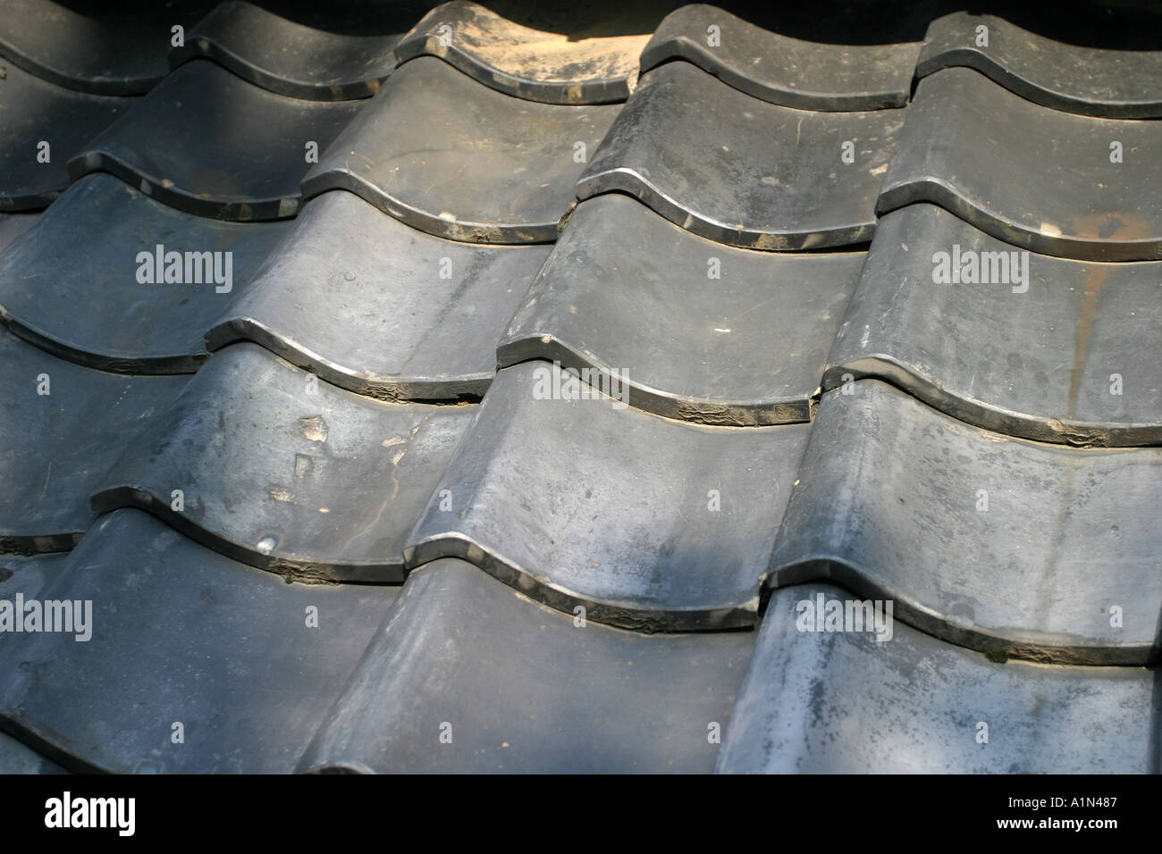 Traditional grey roof tiles on a Japanese town house in Nara Japan Asia Stock Photo