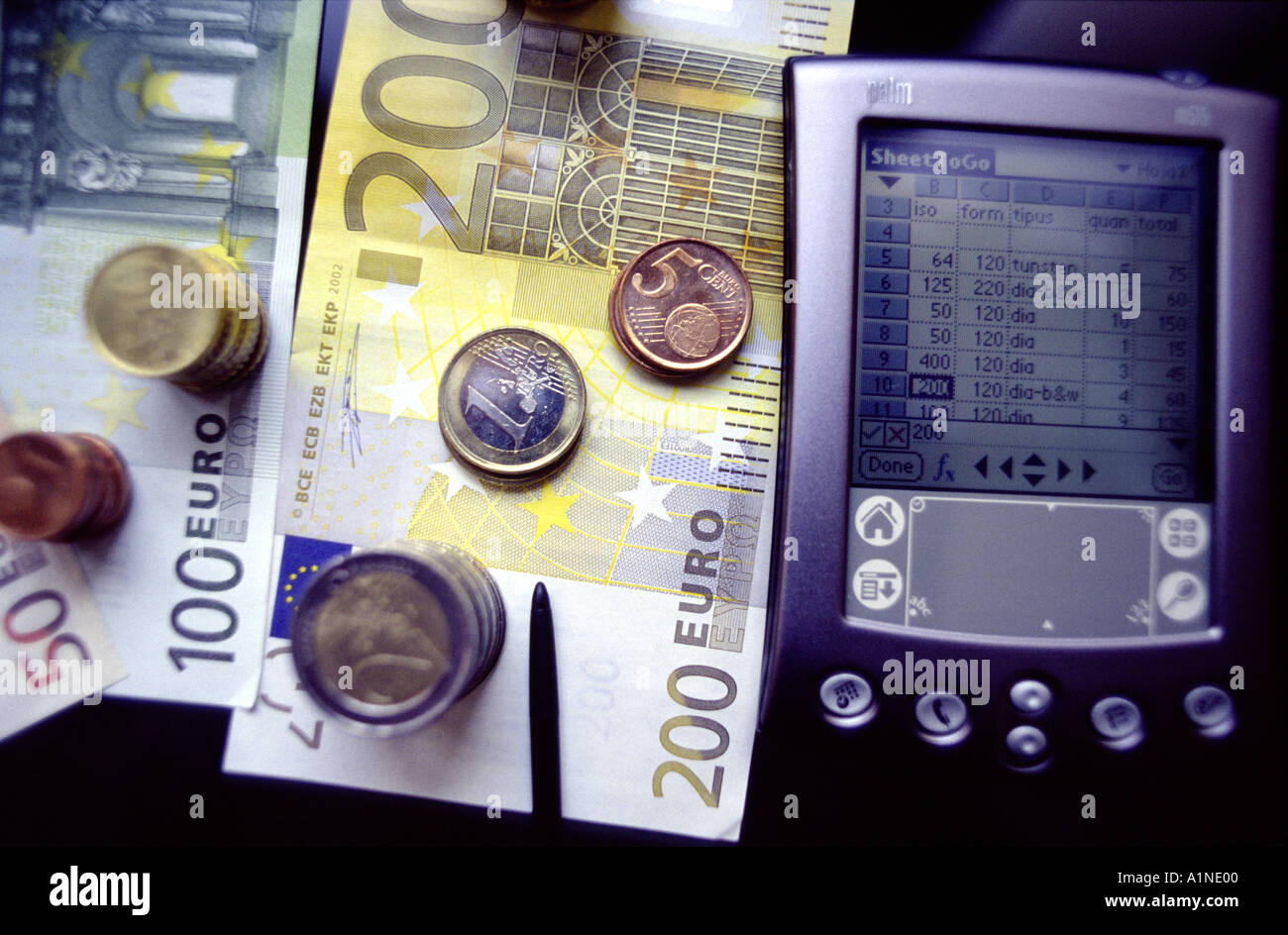 PDA and euro bank note Stock Photo Alamy