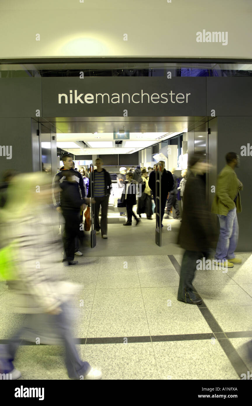 nike store manchester arndale centre inside shopping mall urban city  northern north england colour color vertical consumerism sh Stock Photo -  Alamy