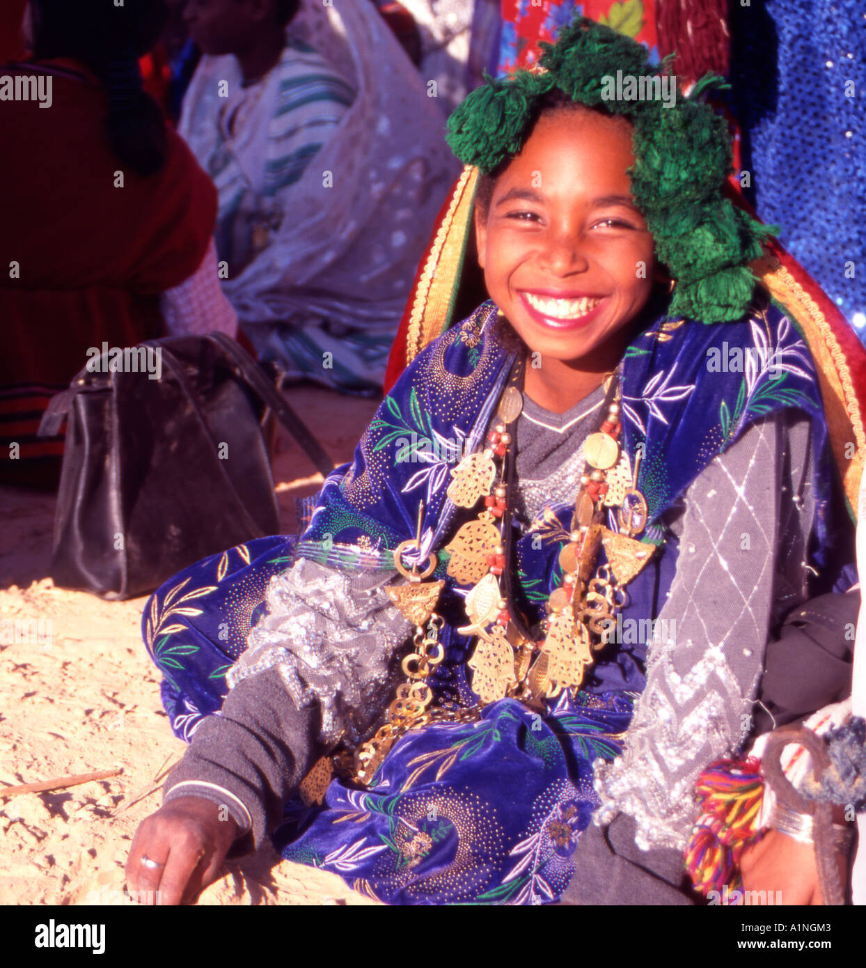 Cheerful Berber Girl at the Douz Desert Festival Tunisia North Africa Stock Photo
