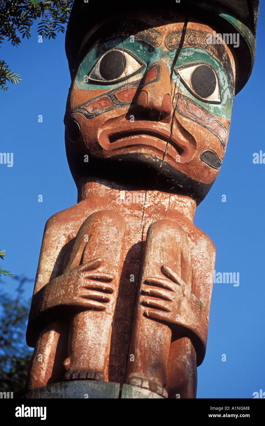 person figure on a totem Wrangell Alaska Stock Photo