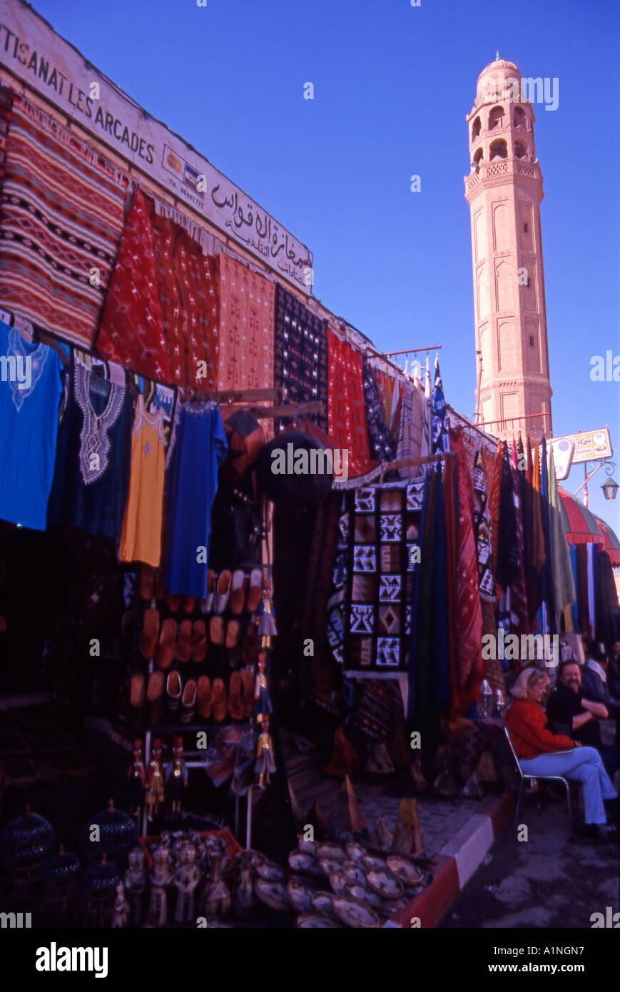 Tunisia North Africa Tozeur Town Mosque and a shop selling touristic items Stock Photo