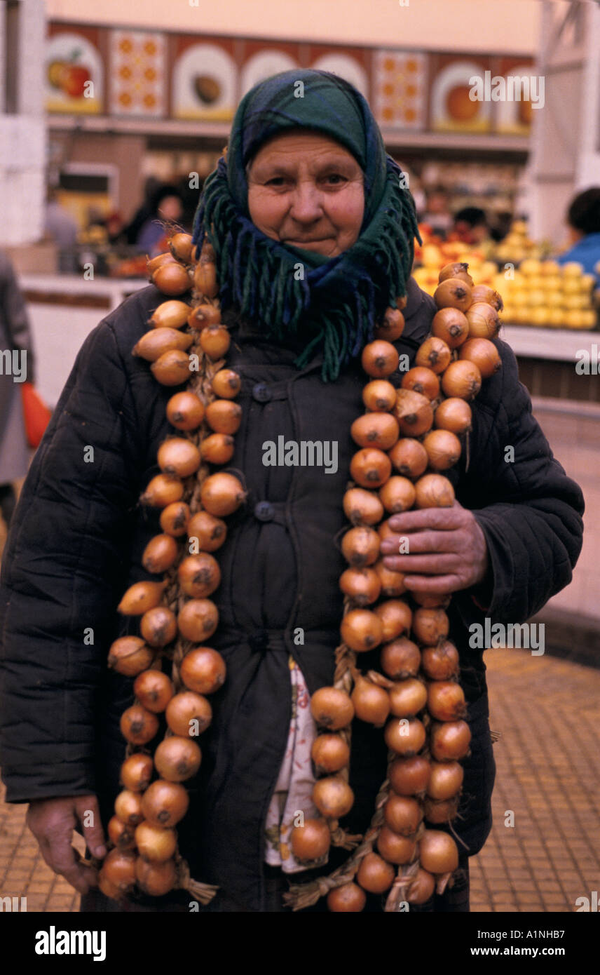 UKRAINE WOMAN WITH ONIONS IN THE CENTRAL MARKET KIEV Stock Photo