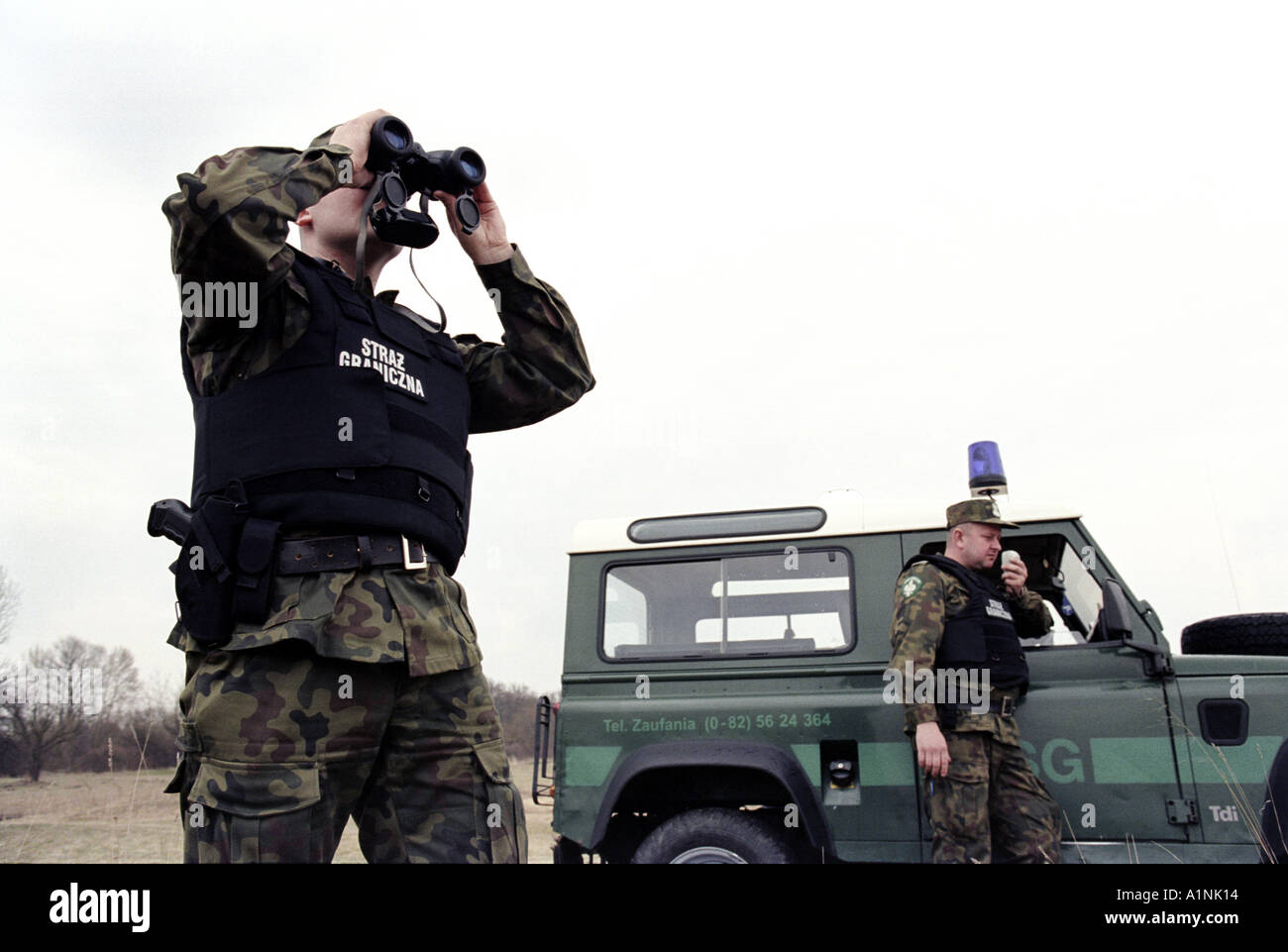 A Polish Border Guard patrolling the border with Ukraine. Stock Photo