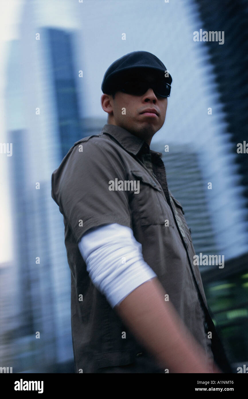 Cool young man walking city hi-res stock photography and images - Alamy