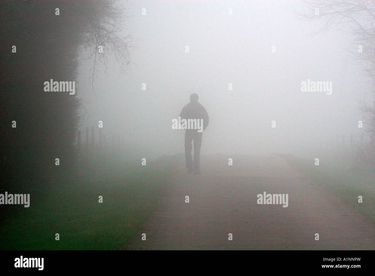 Man walking in country lane hi-res stock photography and images - Alamy