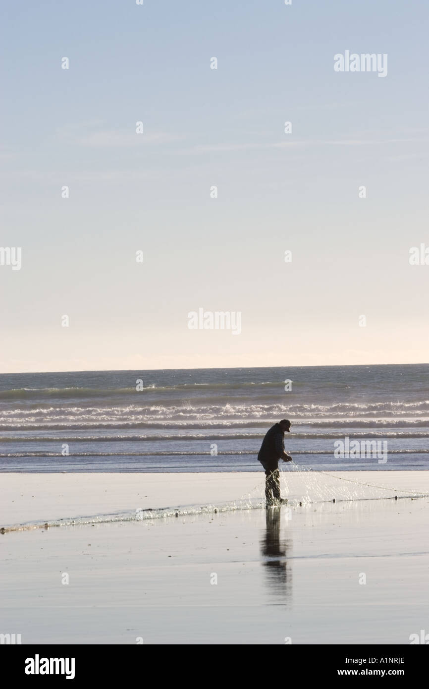 man fishing with nets, Granity, south island, new zealand Stock Photo