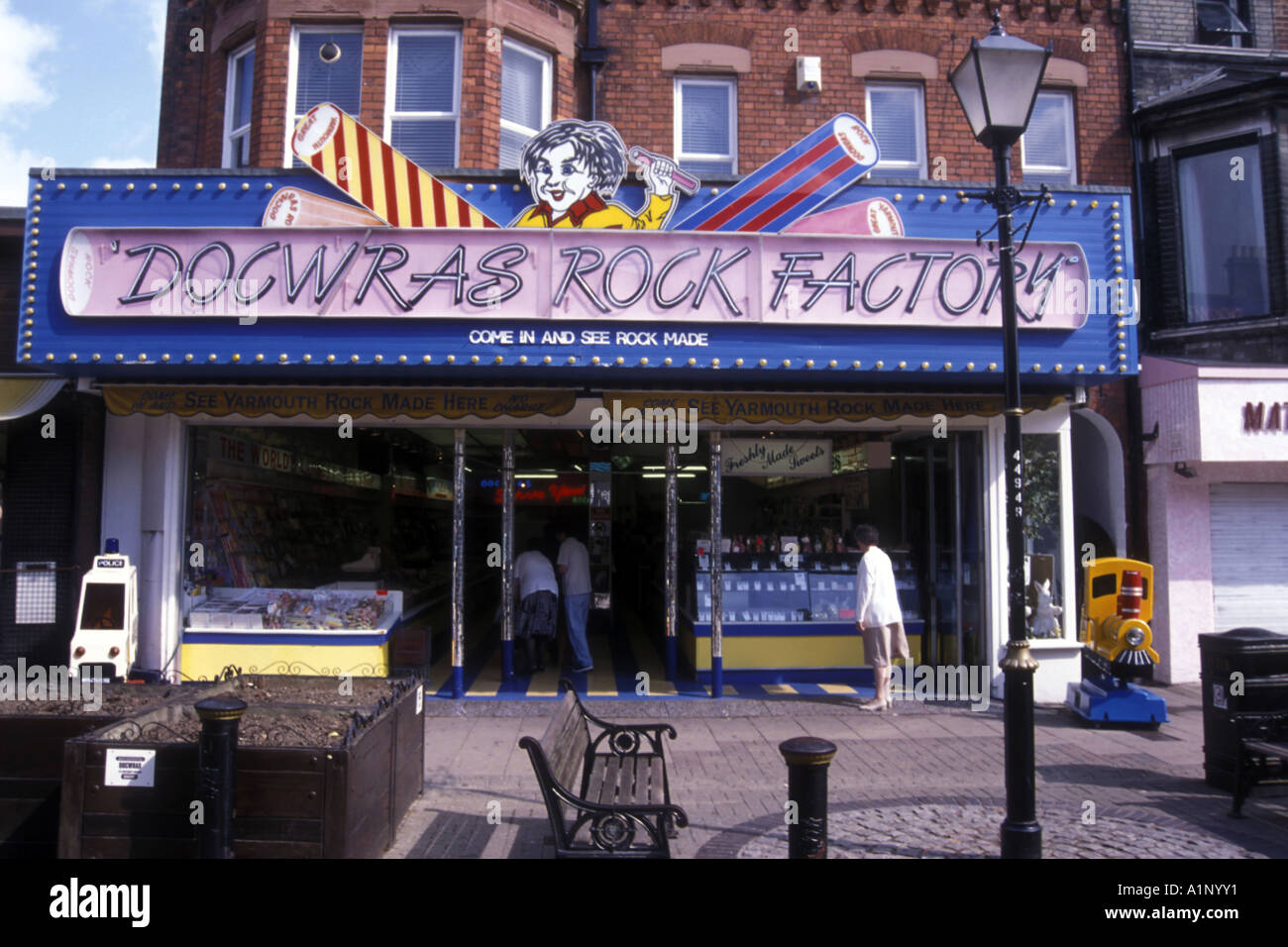A Brightly painted Rock candy store and factory in Great Yarmouth Stock