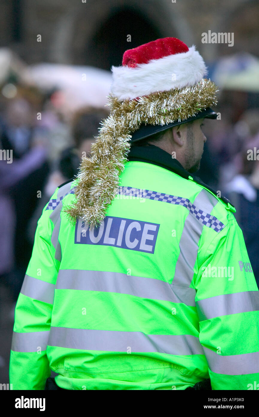 policemen patrolling the Lincoln Christmas Fair, Lincolnshire, UK Stock