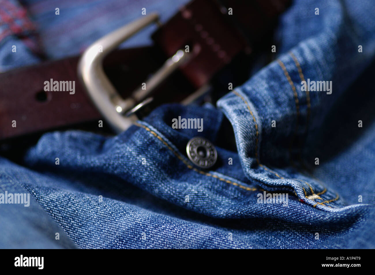 Button fly Denim Jeans with belt and buckle Stock Photo Alamy
