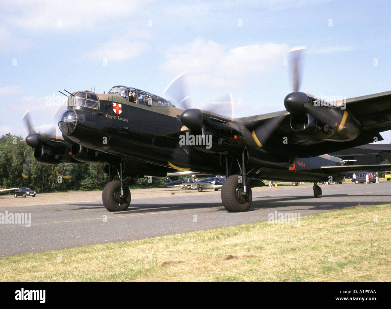 Wartime preserved Avro Lancaster bomber City of Lincoln of the Battle of Britain Memorial Flight prepares to commence airshow flypast Kent England UK Stock Photo