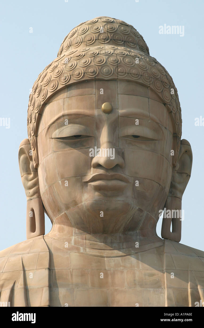 The face of a Japanese Buddha statue near the Mahabodhi temple in Bodhgaya in Bihar in India Stock Photo