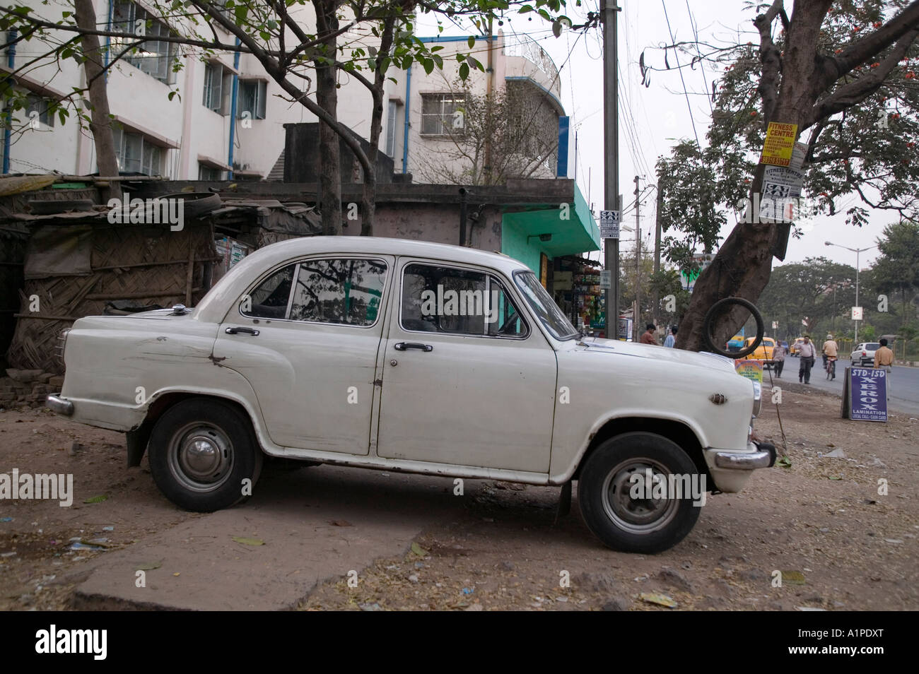 A four door white Ambassador in Calcutta India Stock Photo