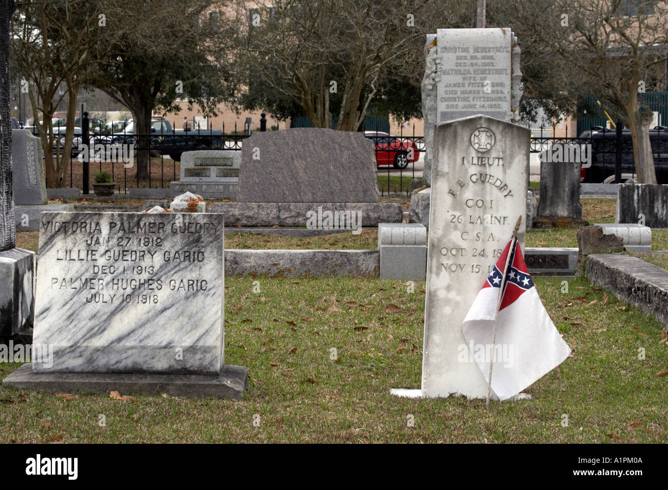 Tombstones and confederate stainless banner flag Stock Photo Alamy