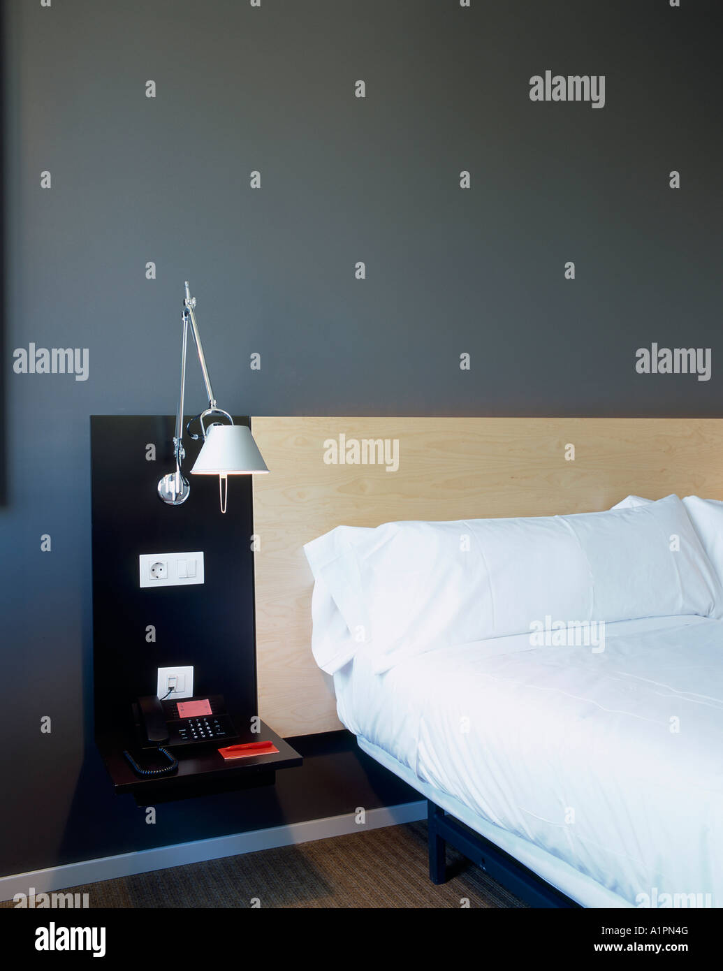 View of a nightstand beside a bed Stock Photo Alamy