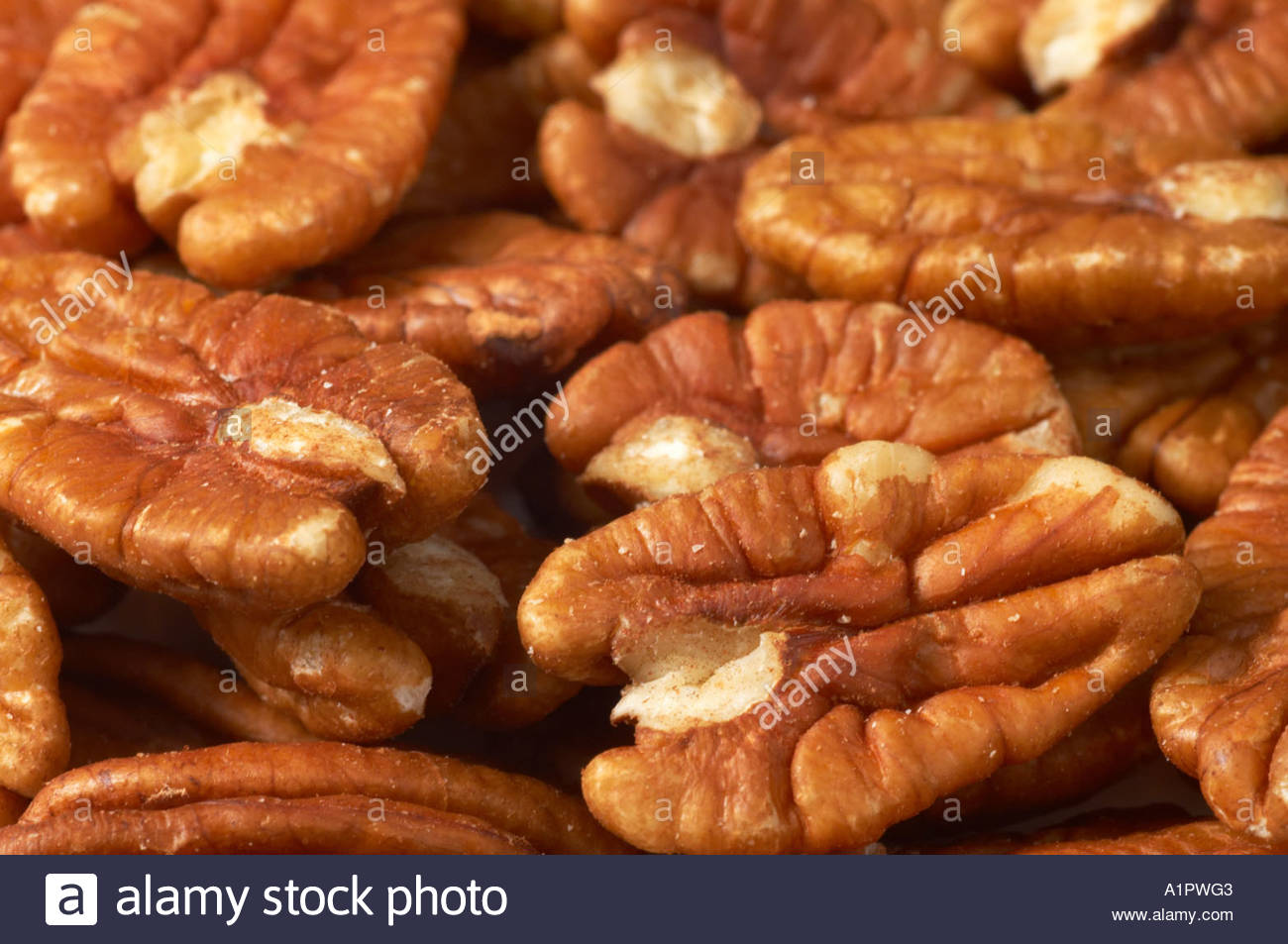 A number of pecan nuts closeup Stock Photo