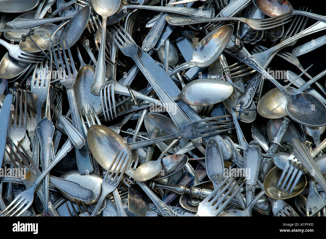 Used forks knives and spoons Stock Photo Alamy