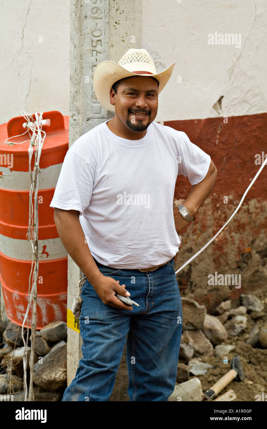de Allende Man wearing cowboy hat lean 