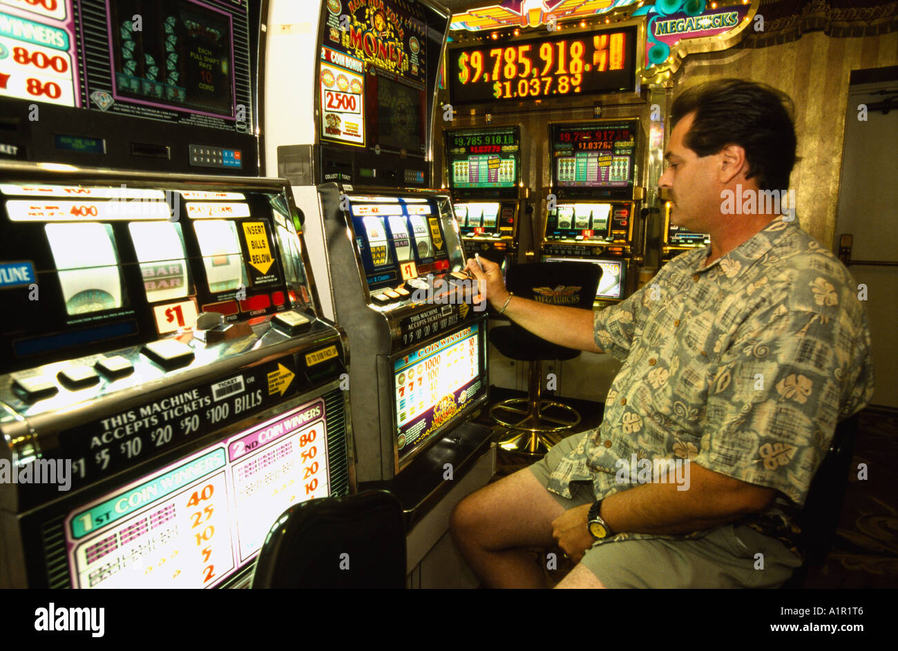 Man Playing Slot Machine