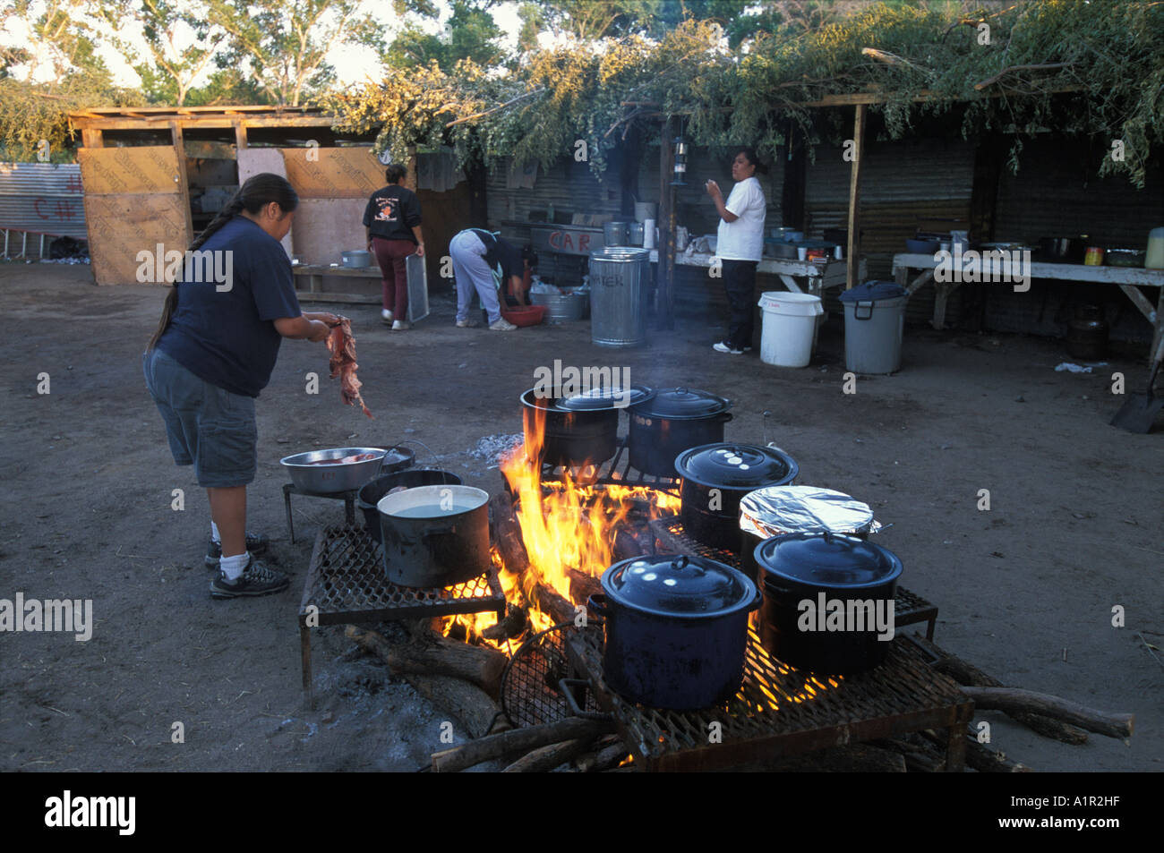 Apache women cooking food during a Sunrise Dance on the San Carlos