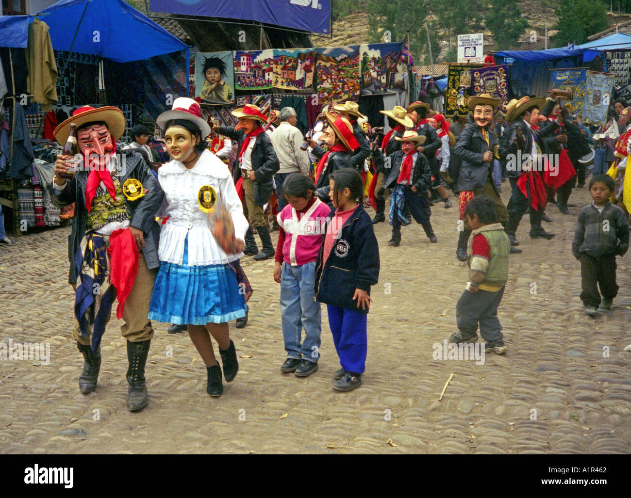 Indigenous people man boy in colourful costumes celebrate history dance act Inca ancestors Pisac Peru South Latin America Stock Photo