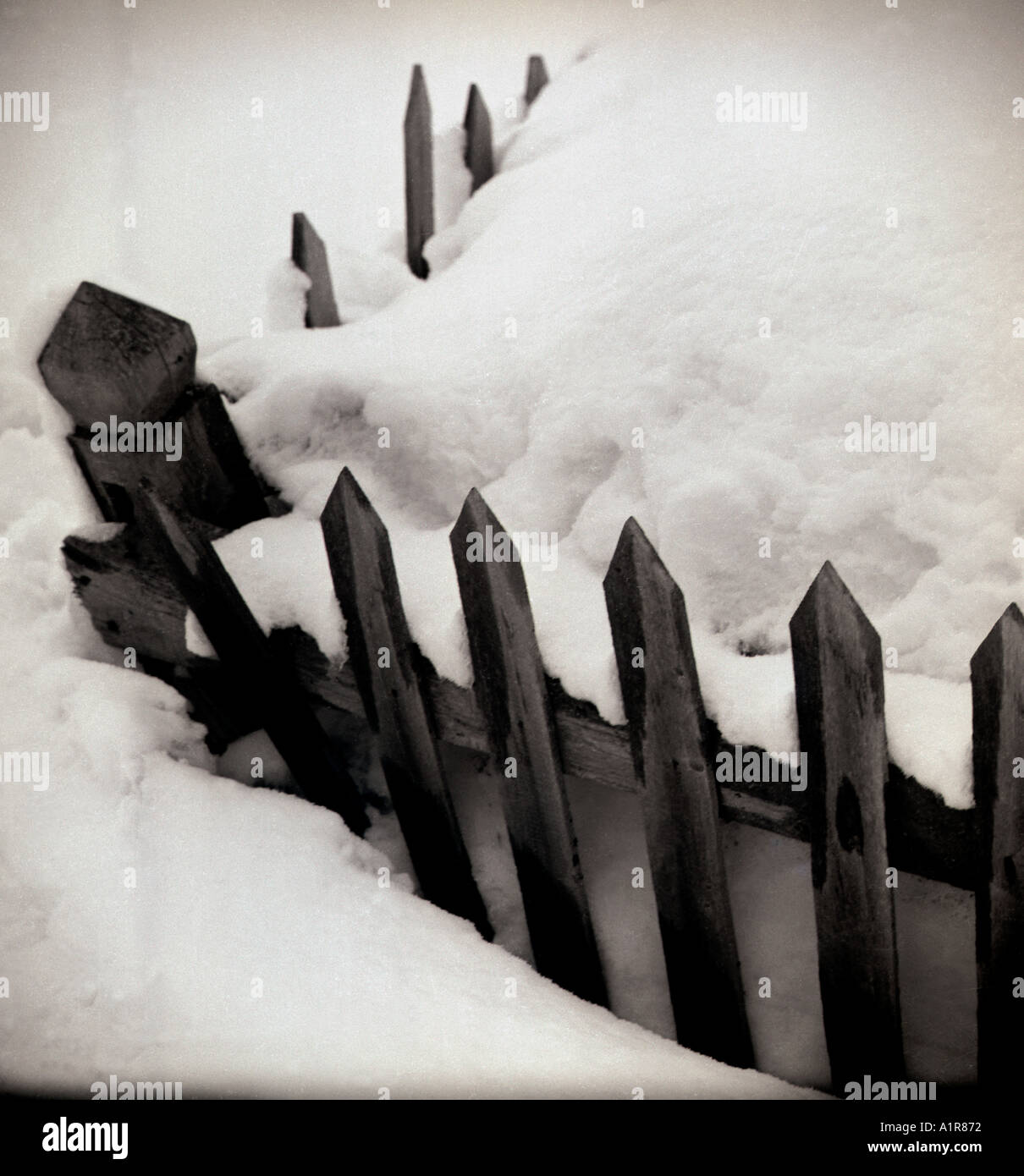 Heavy snow damages fence in Gulmarg Kashmir India Stock Photo