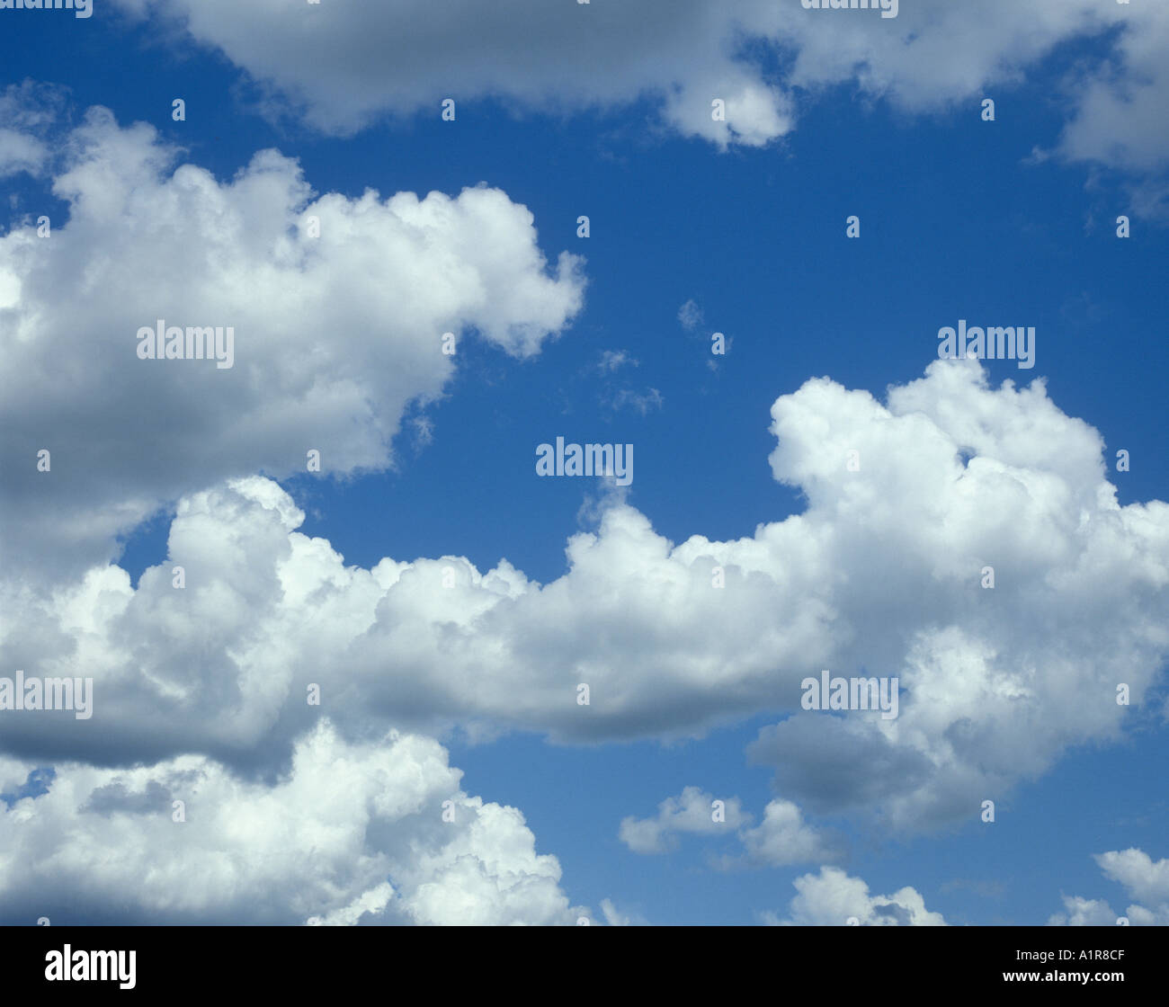 white cumulus clouds blue sky Stock Photo - Alamy