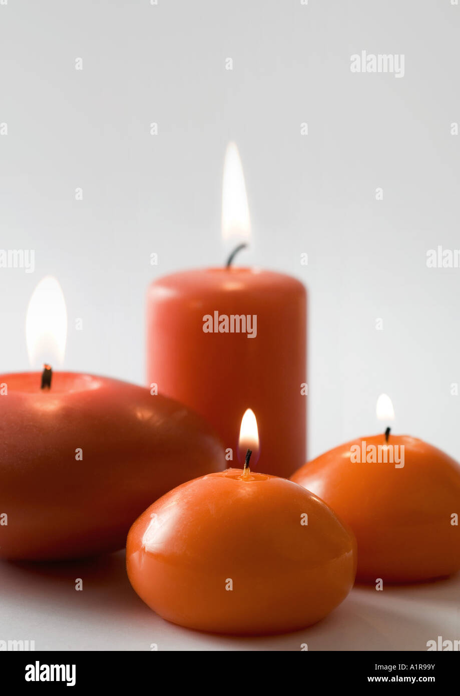 Many candles one candle lit hires stock photography and images Alamy