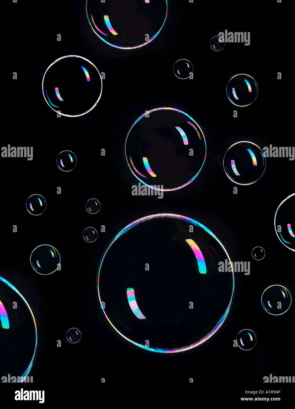 Floating Soap Bubbles With Black Background In Studio Stock Photo