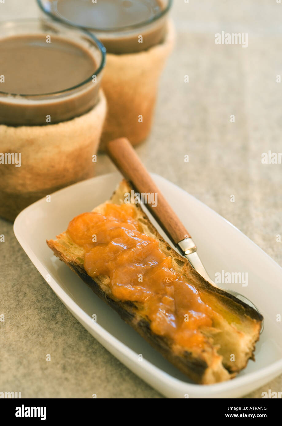 Toast with jam and two cups of coffee Stock Photo