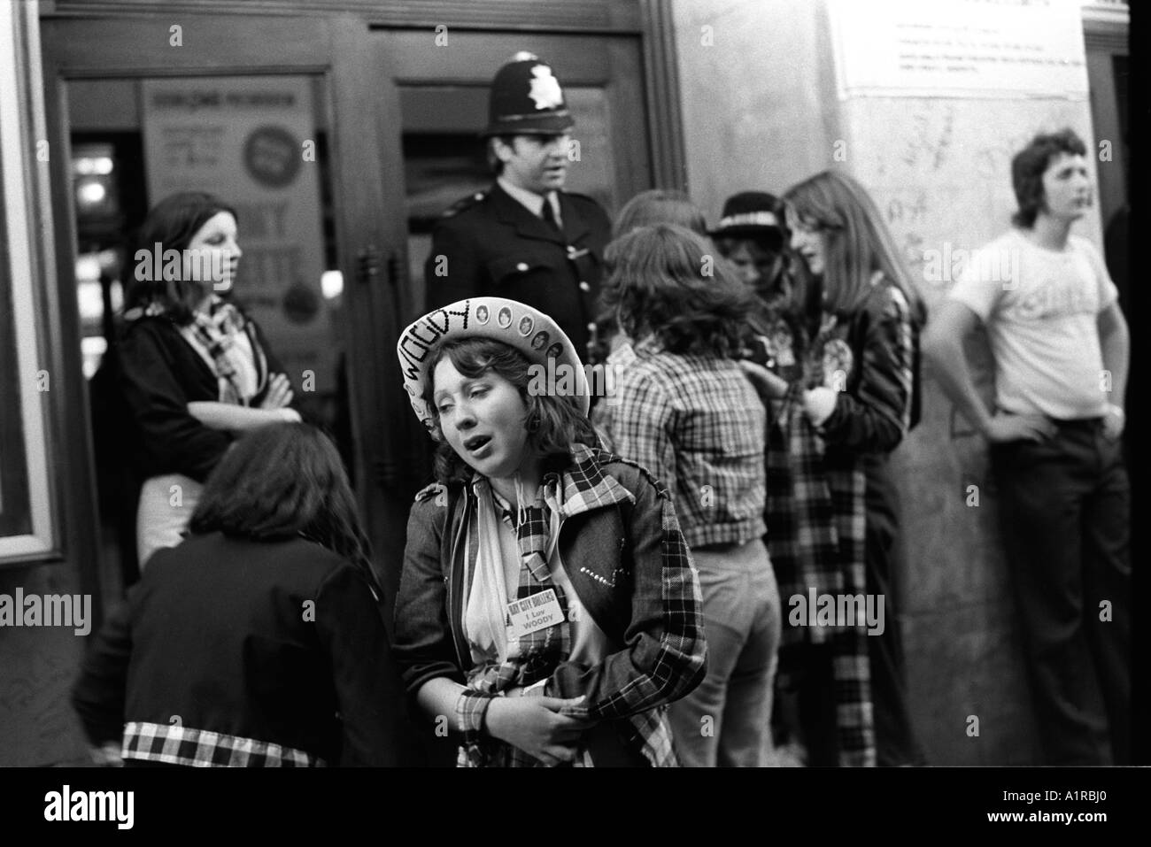 Pop Group Bay City Roller Fans attend a concert at Hammersmith Odeon west London. Crying after the end of the performance. 1970s 1975. HOMER SYKES Stock Photo