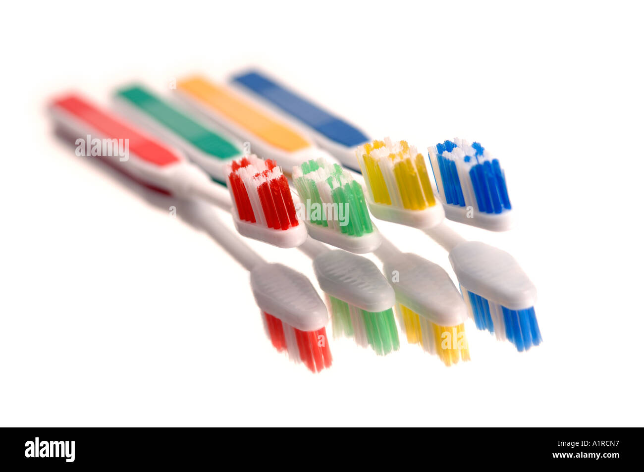 Four toothbrushes Stock Photo