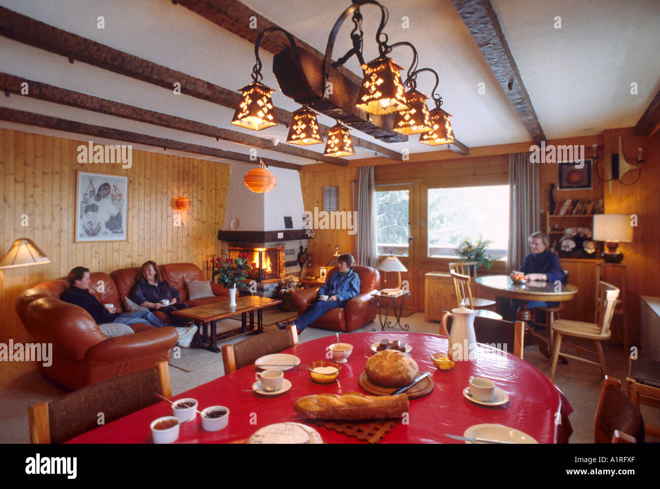 Afternoon tea in a typical swiss ski chalet, Verbier, Bernese Alps, Switzerland Stock Photo