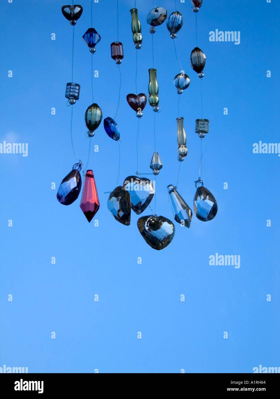 Decorative Healing Crystals Hanging In A Window Stock Photo