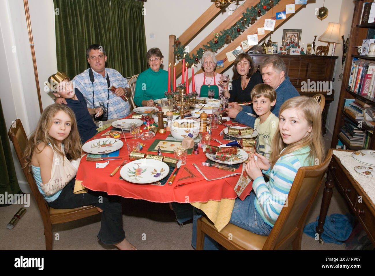 Large family sharing festive Christmas dinner Cotswolds UK Stock Photo