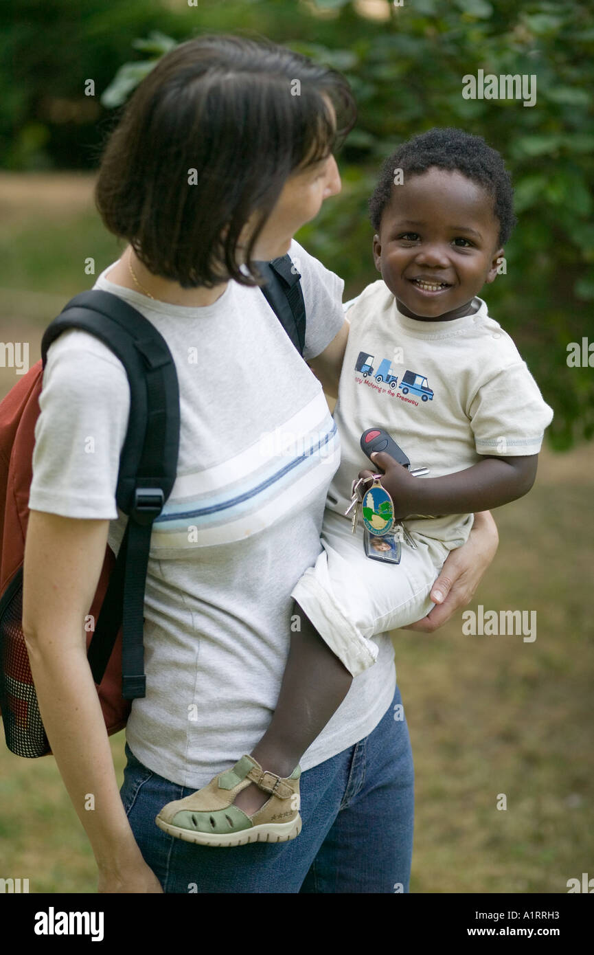 Caucasian mother with african stepchild Stock Photo