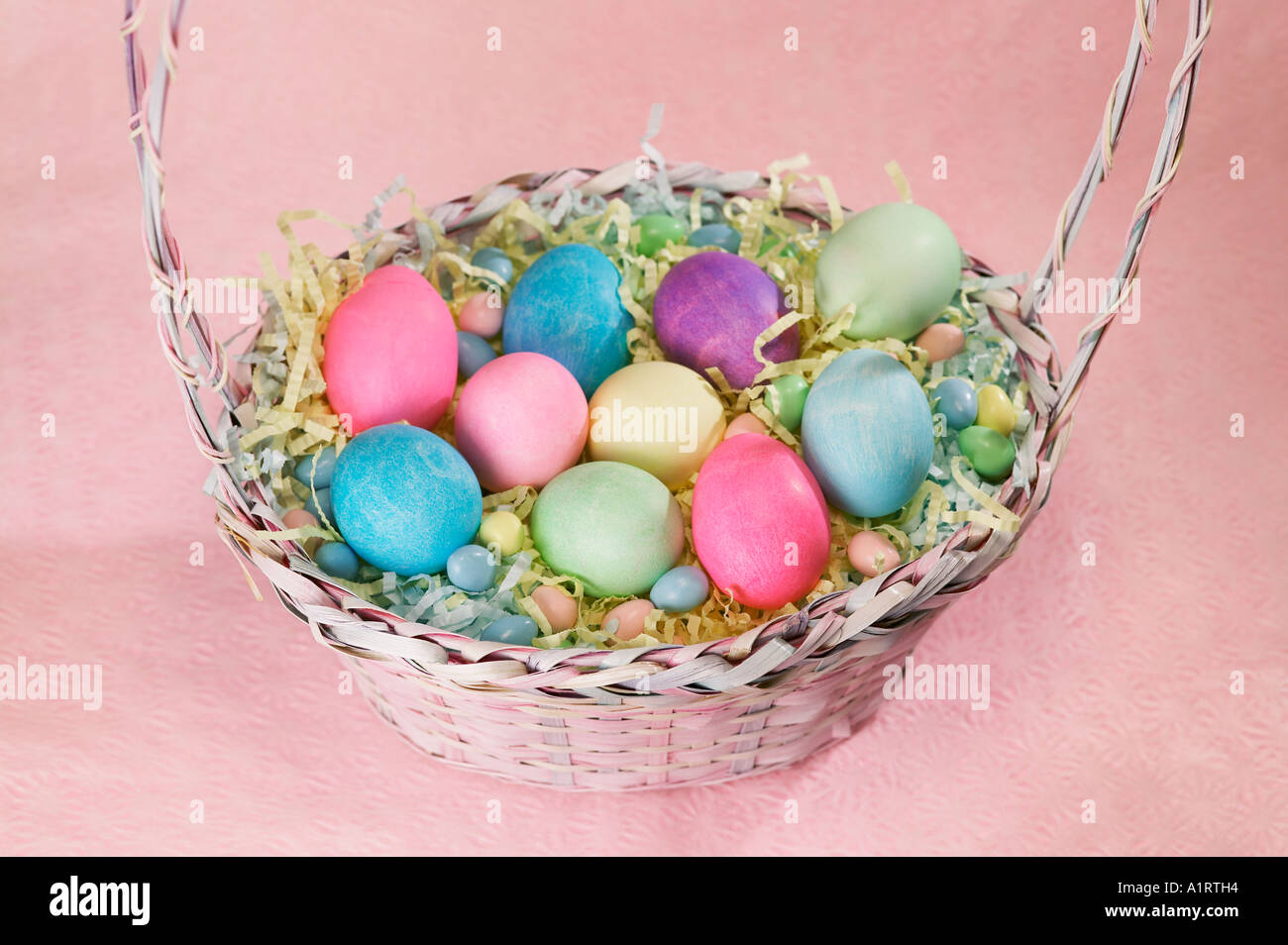 candy eggs in basket Stock Photo Alamy