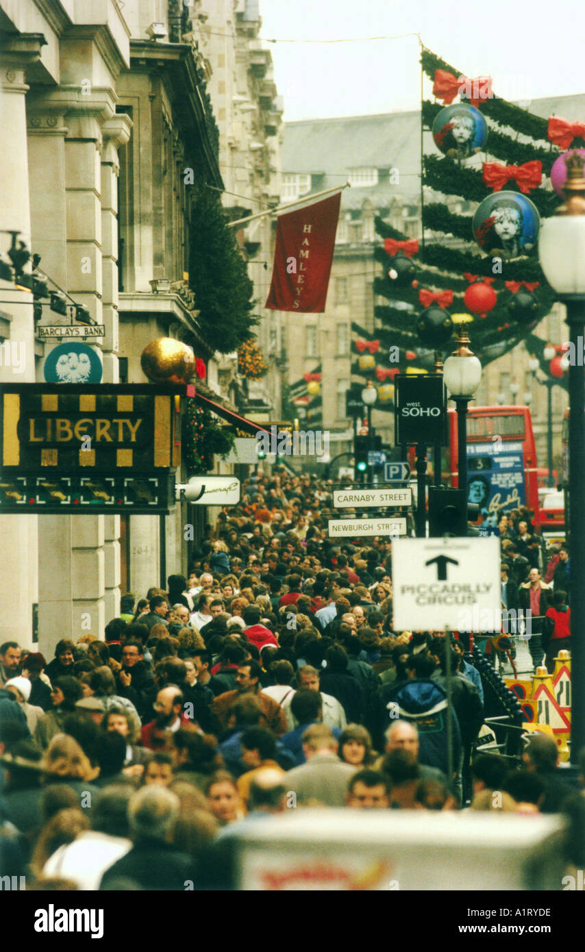 Crowds of people Christmas shopping Regents Street central London Stock Photo