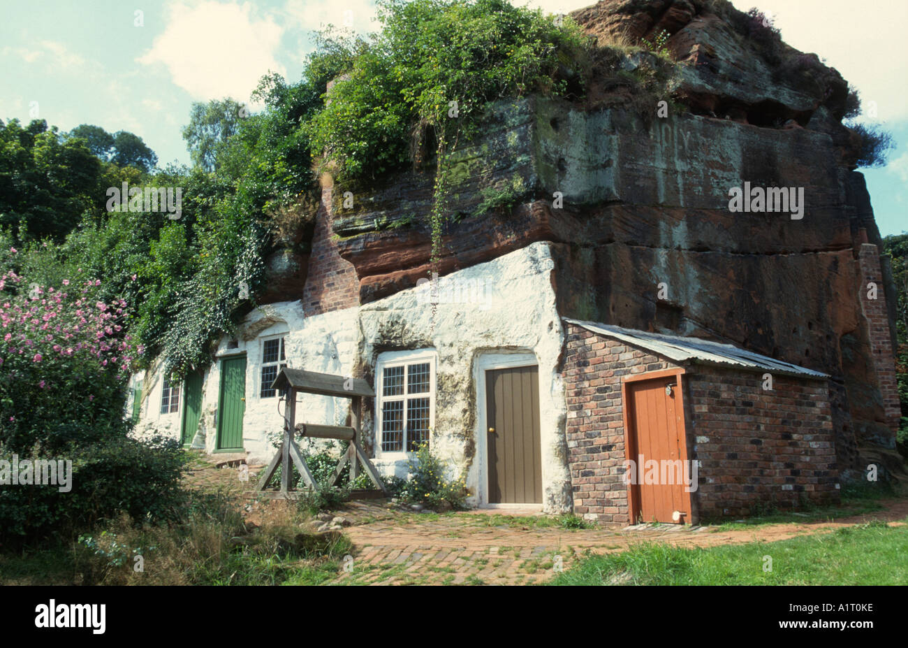 homes carved into sandstone rock at Kinver Midlands UK Stock Photo - Alamy