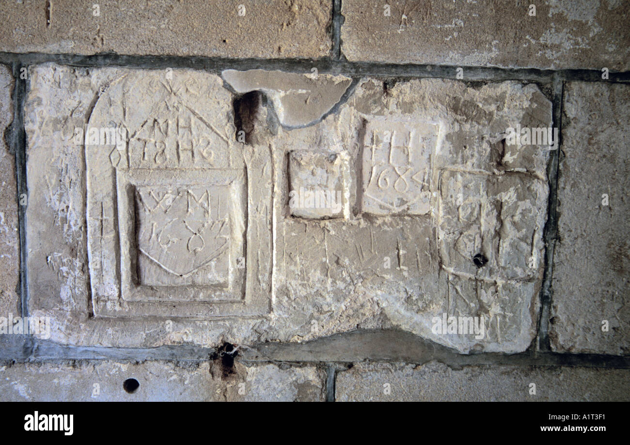 Imber Village Salisbury Plain Wiltshire England Church of St Giles Graffiti in porch Stock Photo