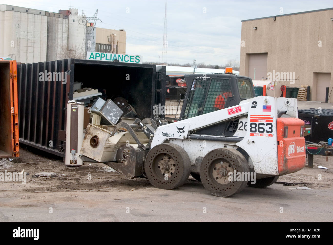 Bobcat front end loader removing items in the Vasko Disposal Solutions junk yard. St Paul