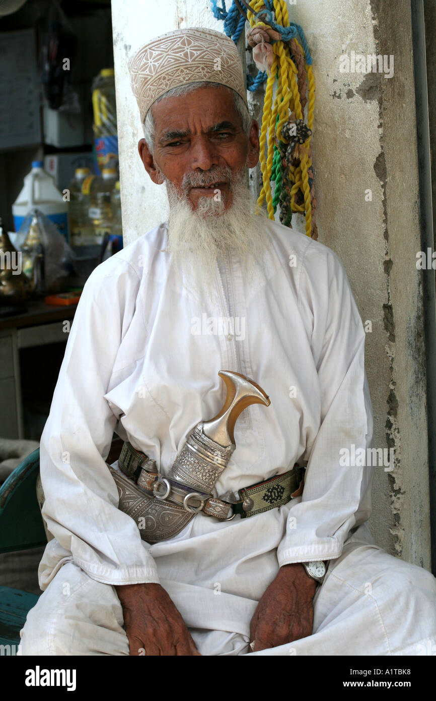 Man wearing a khanjar in a souq in Sinaw, near Nizwa, Oman Stock Photo
