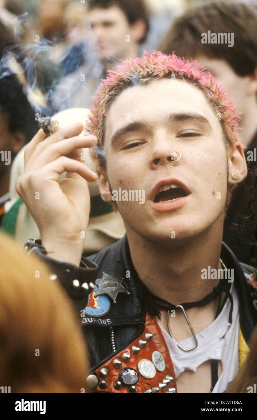 Punk Rocker a teen, smoking a joint, a roll your own spiff at a ...