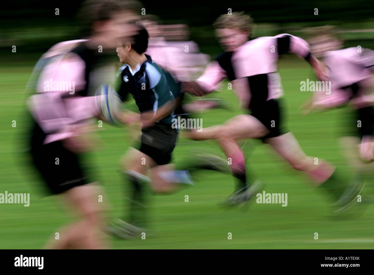 Rugby in motion Stock Photo - Alamy