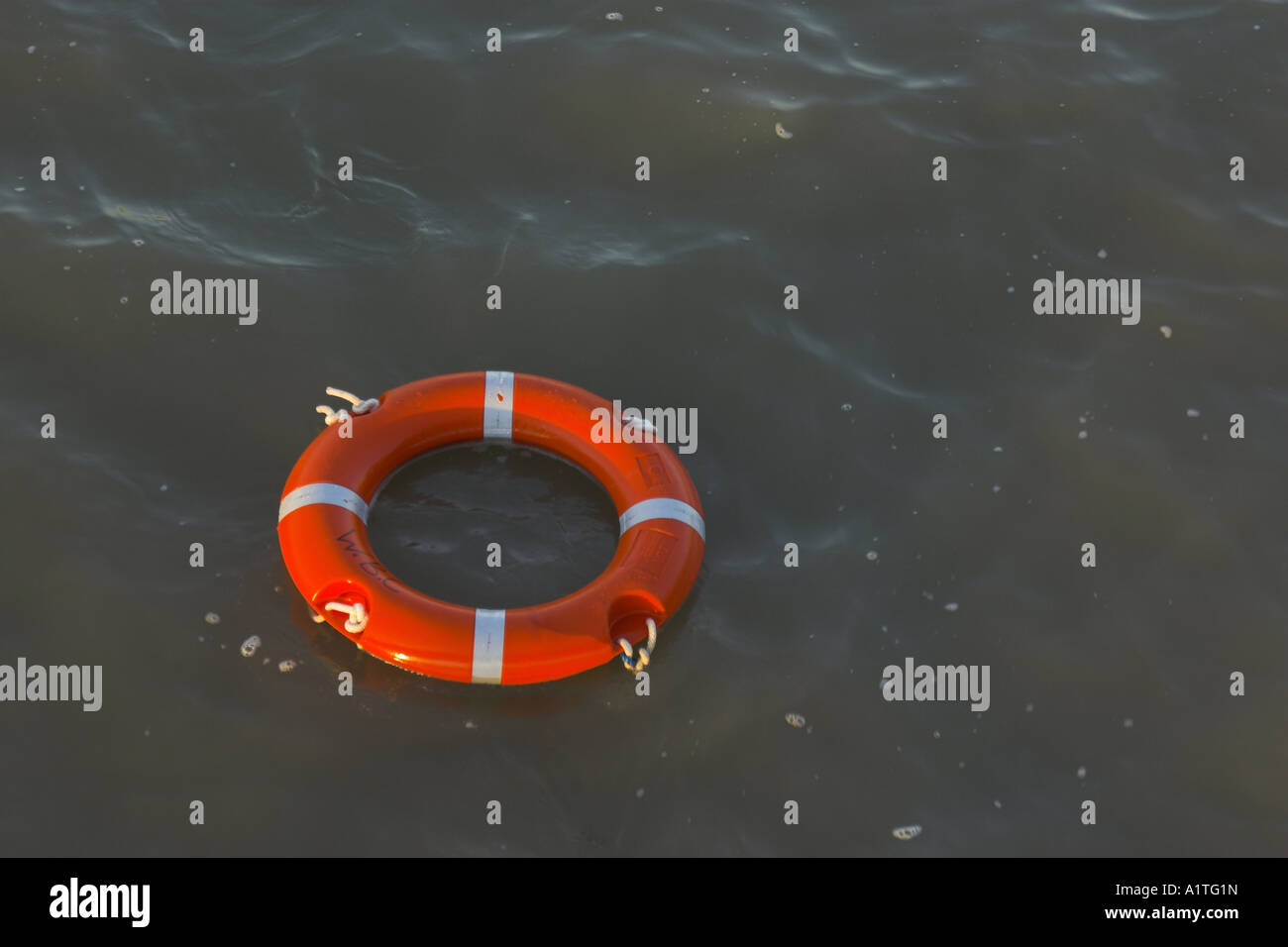 A Lifebelt (Safety Ring) floating freely in the sea Stock Photo Alamy